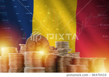 Chad flag and big amount of golden bitcoin coins and trading platform chart. Crypto currency 96470410