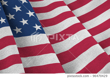 United States of America flag with big folds waving close up under the studio light indoors. The official symbols and colors in banner United States of America flag with big folds waving close up under the studio light indoors. The official symbols and colors in banner 96470429