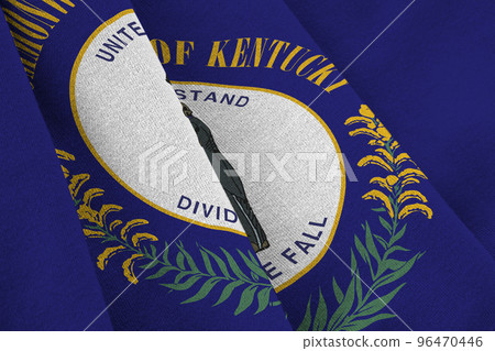 Kentucky US state flag with big folds waving close up under the studio light indoors. The official symbols and colors in banner 96470446