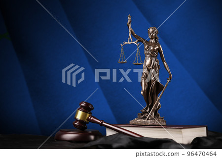 Nevada US state flag with statue of lady justice, constitution and judge hammer on black drapery. Concept of judgement and guilt Nevada US state flag with statue of lady justice, constitution and judge hammer on black drapery. Concept of judgement and guilt 96470464