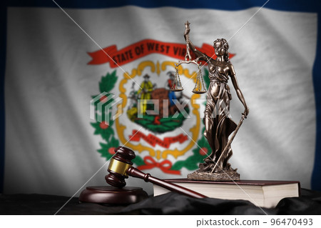West Virginia US state flag with statue of lady justice, constitution and judge hammer on black drapery. Concept of judgement and guilt West Virginia US state flag with statue of lady justice, constitution and judge hammer on black drapery. Concept of judgement and guilt 96470493