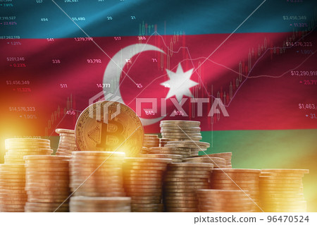 Azerbaijan flag and big amount of golden bitcoin coins and trading platform chart. Crypto currency 96470524