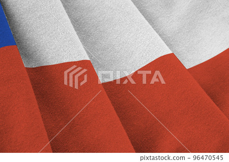 Chile flag with big folds waving close up under the studio light indoors. The official symbols and colors in banner Chile flag with big folds waving close up under the studio light indoors. The official symbols and colors in banner 96470545