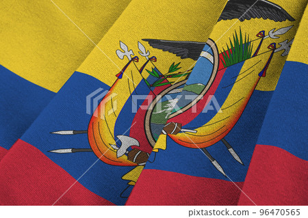 Ecuador flag with big folds waving close up under the studio light indoors. The official symbols and colors in banner Ecuador flag with big folds waving close up under the studio light indoors. The official symbols and colors in banner 96470565