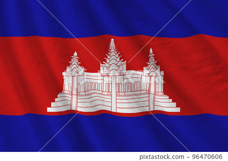 Cambodia flag with big folds waving close up under the studio light indoors. The official symbols and colors in banner 96470606