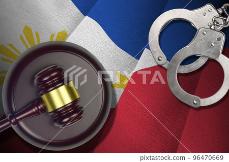 Philippines flag with judge mallet and handcuffs in dark room. Concept of criminal and punishment, background for judgement topics 96470669