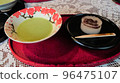Japanese culture, matcha green tea and Japanese sweets. The inside of the vessel is autumn leaves, green and vermilion. 96475107