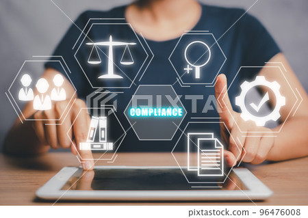 Compliance Rules Law Regulation Policy Business Technology concept, Woman hand touching compliance icon on vr screen. 96476008