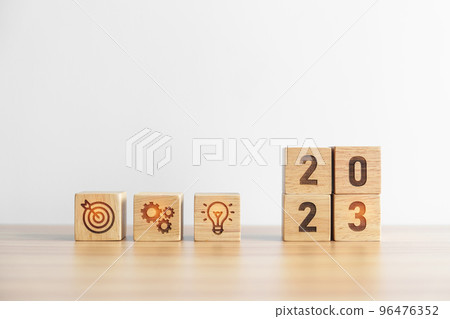 2023 wood block with business goal, plan. Action strategy, target, mission, teamwork, idea and New Year start concept 2023 wood block with business goal, plan. Action strategy, target, mission, teamwork, idea and New Year start concept 96476352