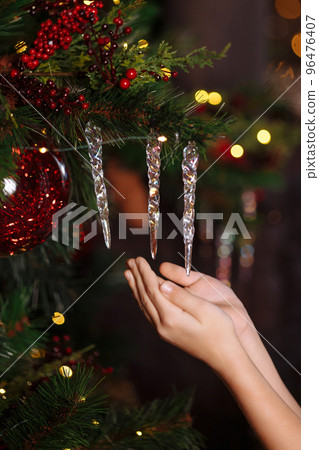 Decorated Christmas tree on blurred background. Decorated Christmas tree on blurred background. 96476407