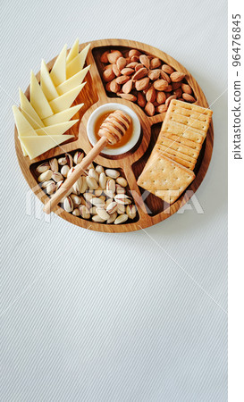 Wooden round menagerie in women's hands 96476845