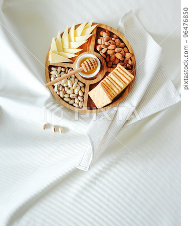 Wooden round menagerie in women's hands Wooden round menagerie in women's hands 96476850