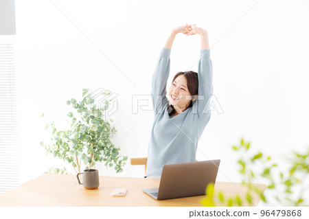 Woman doing work at home Woman doing work at home 96479868