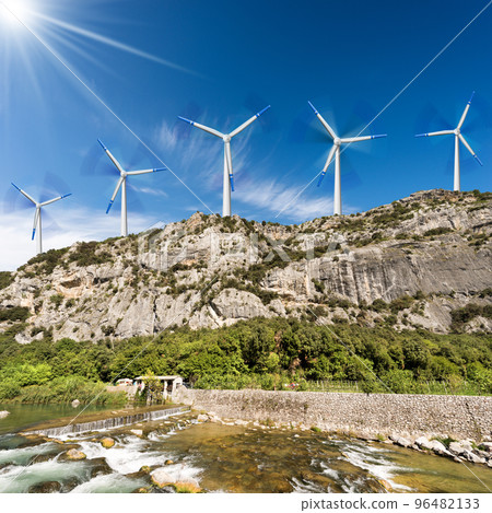 Group of Wind Turbines on the top of a Mountain Landscape Group of Wind Turbines on the top of a Mountain Landscape 96482133