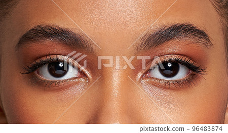 Beautiful female eyes with long eyelashes Beautiful female eyes with long eyelashes 96483874