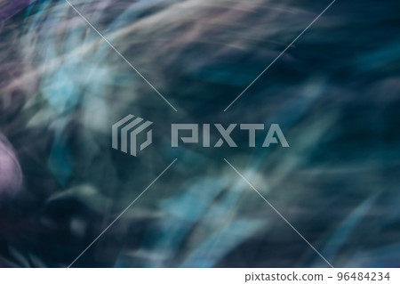 Lens flare overlay. Light leak. Blur glow defect. Defocused blue purple color rays texture on dark black abstract copy space background. 96484234