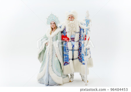 a traditional Father Frost and Snow Maiden costume on a white background. a traditional Father Frost and Snow Maiden costume on a white background. 96484453