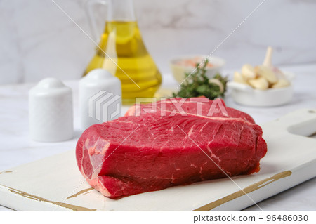 Closeup view of raw top side beef steak Closeup view of raw top side beef steak 96486030