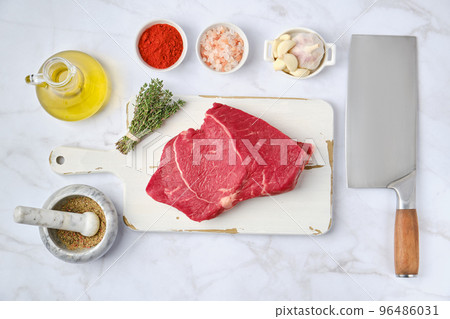 Overhead view of raw top side beef steak Overhead view of raw top side beef steak 96486031