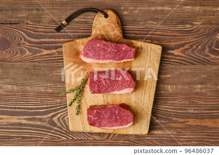 Overhead view of raw fresh eye of round steak 96486037