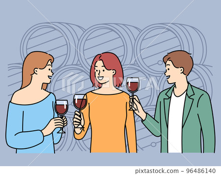 Smiling people tasting wine in cellar  96486140