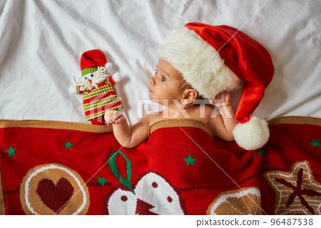 Little newborn baby, wearing Santa hat 96487538