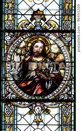 Sacred heart of Jesus, stained glass window in Cathedral of St Nicholas in Novo Mesto, Slovenia 96493209
