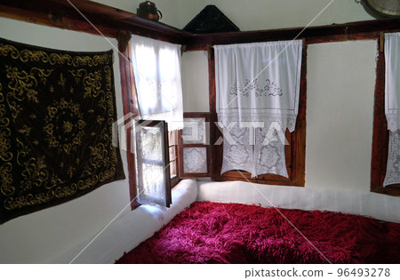 Ethnological museum, artifacts, rug and copper,  in Berat, Albania 96493278