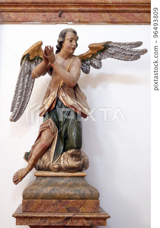 Angel on the altar in the church of Saint Leonard of Noblac in Kotari, Croatia 96493809