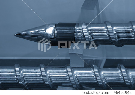 Close up scene the end of injection machine screw spare parts. Close up scene the end of injection machine screw spare parts. 96493943