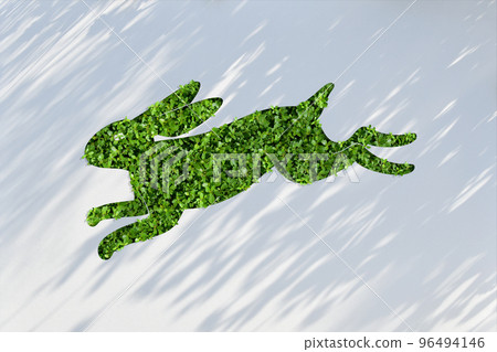 Green rabbit paper art that can be used for New Year's cards to make 2023 eco-friendly. Green rabbit paper art that can be used for New Year's cards to make 2023 eco-friendly. 96494146