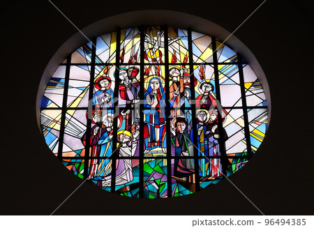 Pentecost, stained glass window in the Saint Lawrence church in Kleinostheim, Germany Pentecost, stained glass window in the Saint Lawrence church in Kleinostheim, Germany 96494385