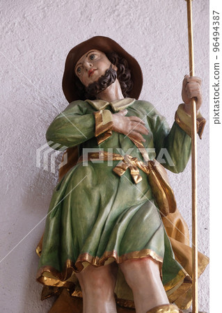 Statue of Saint in the Saint Lawrence church in Kleinostheim, Germany Statue of Saint in the Saint Lawrence church in Kleinostheim, Germany 96494387