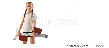 Portrait of little girl, beginner athlete in sportswear posing with starting blocks isolated over white background, Sport, school, skills, fashion and style 96495959