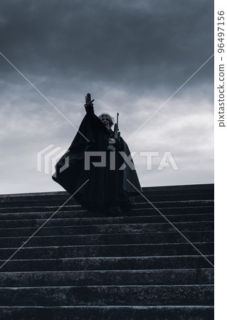 armed dark fat soldier marching on guard outdoors war evil dark ages concept 96497156