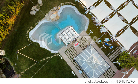 aerial drone view Wedding party at villa with pool location in Piacenza Italy 96497170