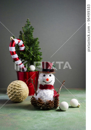 Christmas ornaments snowman, candy cande, christmas tree and baubles. Abstract winter, seasonal background. 96499383