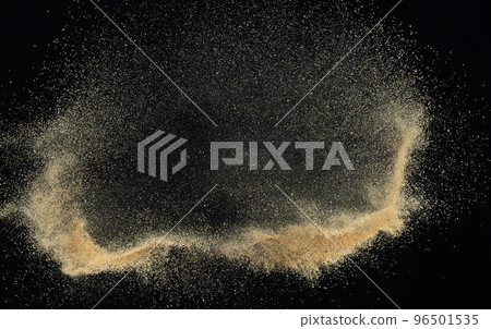 Sand flying explosion, Golden sand wave explode. Abstract sands cloud fly. Yellow colored sand splash throwing in Air. black background Isolated high speed shutter, throwing freeze stop motion Sand flying explosion, Golden sand wave explode. Abstract sands cloud fly. Yellow colored sand splash throwing in Air. black background Isolated high speed shutter, throwing freeze stop motion 96501535