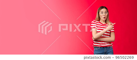 Impressed outgoing good-looking blond asian girl gasping wondered say wow surprised pointing upper right corner intrigued discuss awesome new trends stand red background astonished Impressed outgoing good-looking blond asian girl gasping wondered say wow surprised pointing upper right corner intrigued discuss awesome new trends stand red background astonished 96502269