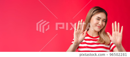 No thanks I pass. Reluctant lazy cute asian modern girl show hands block rejection gesture, smirking displeased shake head no emotion, unwilling participate, show refusal, stand red background No thanks I pass. Reluctant lazy cute asian modern girl show hands block rejection gesture, smirking displeased shake head no emotion, unwilling participate, show refusal, stand red background 96502281