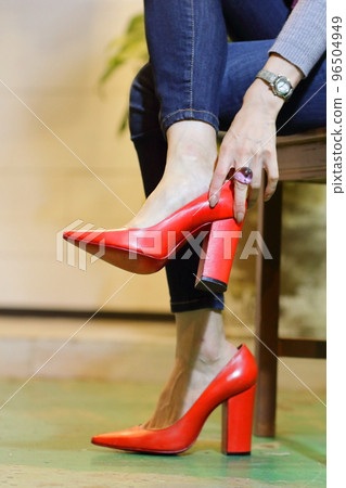 Image of a woman wearing red high heels Image of a woman wearing red high heels 96504949