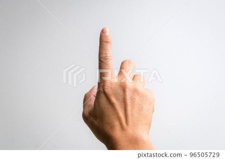 Male hand with index finger pointing up. Male hand with index finger pointing up. 96505729