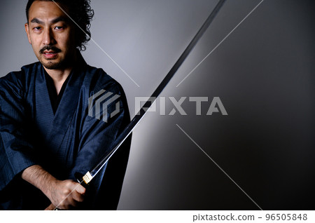 Image of a cool Japanese samurai with a sword Image of a cool Japanese samurai with a sword 96505848