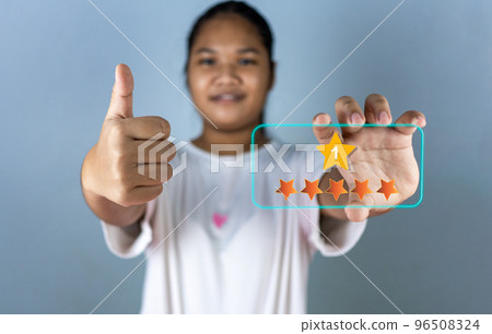 Hand choosing 5 star icon. represents feedback rating No. 1 and positive customer review, Satisfaction Concept, satisfaction survey. Hand choosing 5 star icon. represents feedback rating No. 1 and positive customer review, Satisfaction Concept, satisfaction survey. 96508324