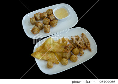 Top view of (Hoi Jo)Deep Fried Crab Meat Rolls and fried dumplings, focus selective 96509066