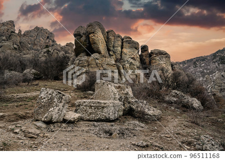 Bizarre rocks of Valley of ghosts on Mount Demerdzhi in spring. Crimea Bizarre rocks of Valley of ghosts on Mount Demerdzhi in spring. Crimea 96511168