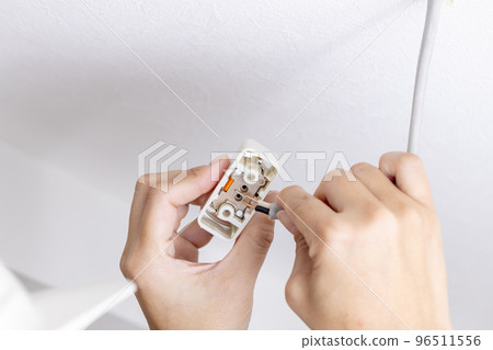 Hanging ceiling installation work for lighting fixtures Hanging ceiling installation work for lighting fixtures 96511556