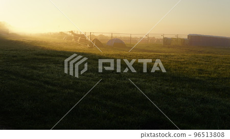 colorful summer morning with golden light and fog between hills colorful summer morning with golden light and fog between hills 96513808