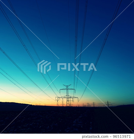 High voltage pylons. Rising energy prices - a concept for industry and energy. Increasing the price of electricity. Concept for industry and energy. The crisis in Europe caused by Russian aggression 96513971