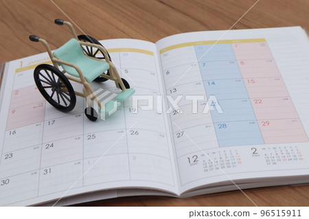 wheelchair and notebook 96515911